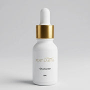 XLNT Lashes Glue Bonder 15ml white dropper bottle with gold collar for eyelash extensions.