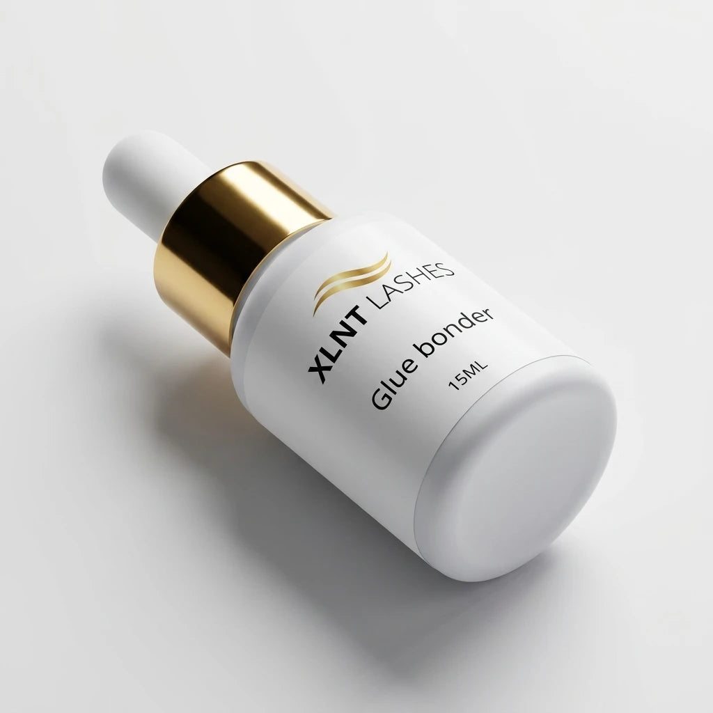 XLNT LASHES 15ml eyelash extension glue bonder in a matte white dropper bottle with gold cap.