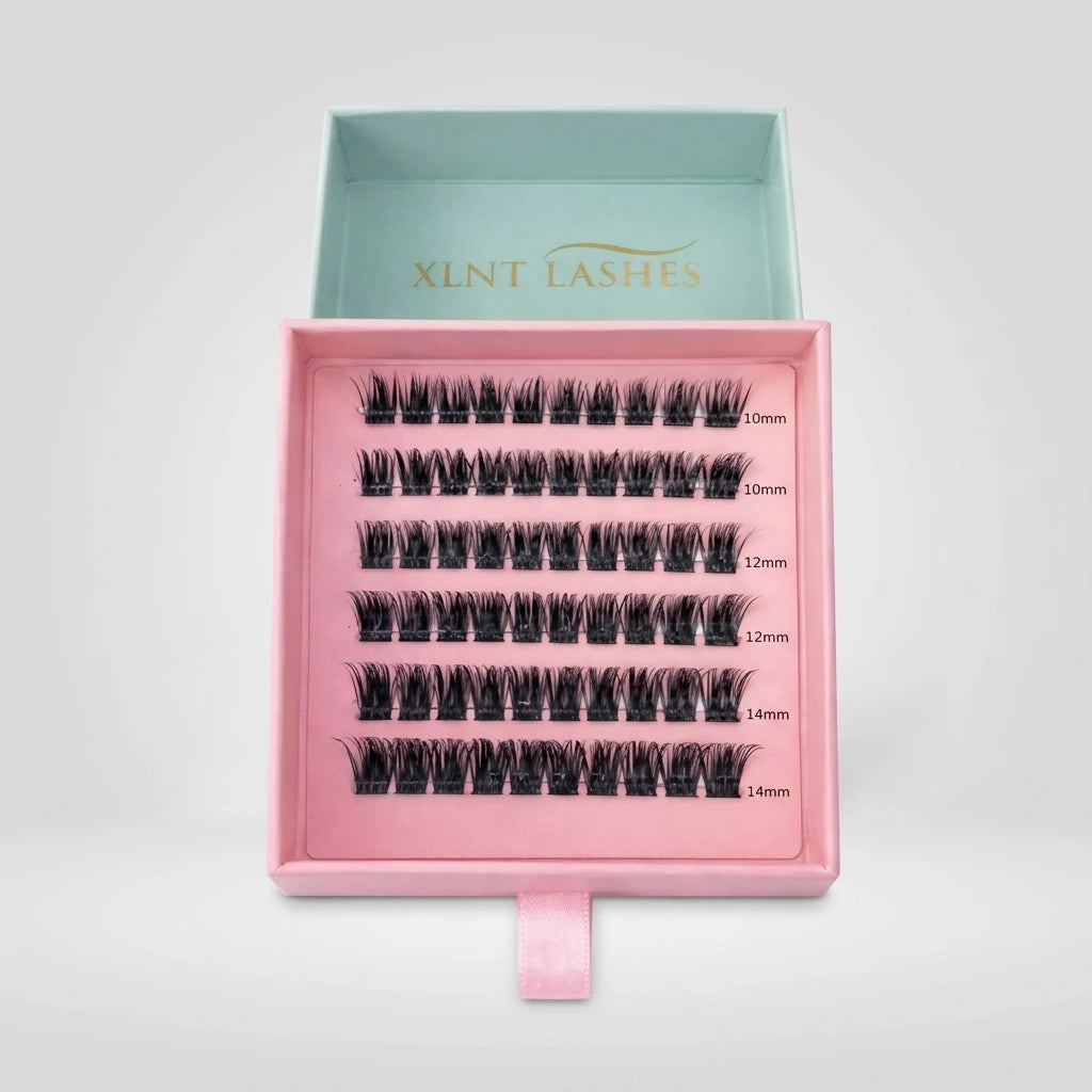 Easy Lashes Mix Classic 10–14 mm, svarta franskluster i rosa och mintgrön förpackning på grå bakgrund.