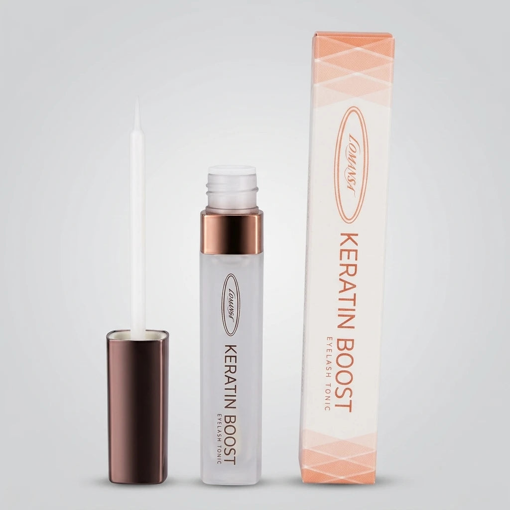 Keratin Boost Serum Lomansa – frostad flaska, roséguldsdetaljer, vit applikatorpensel och förpackning.