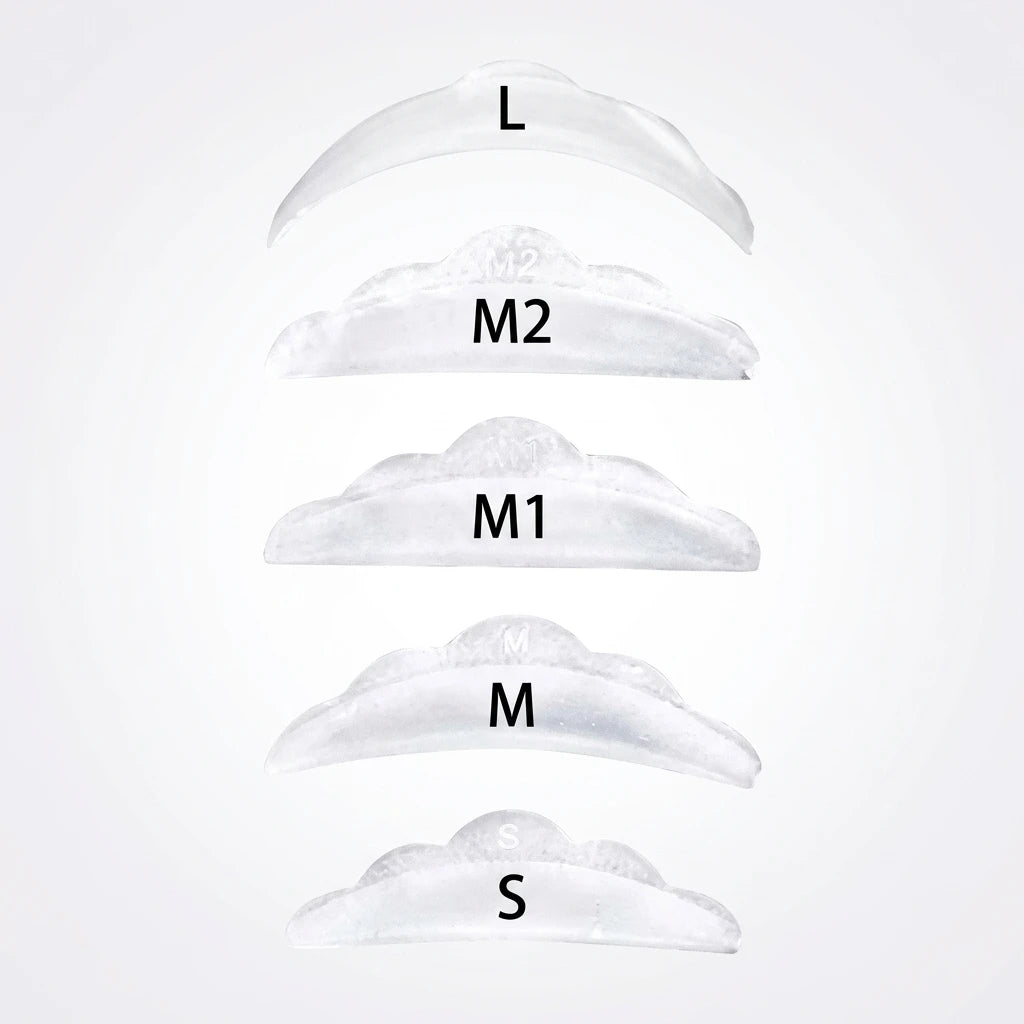 Transparenta Lash Lift Silikon Spole Moln - 5 Storlekar (S, M, M1, M2, L) i mjuk silikon mot ljus bakgrund.