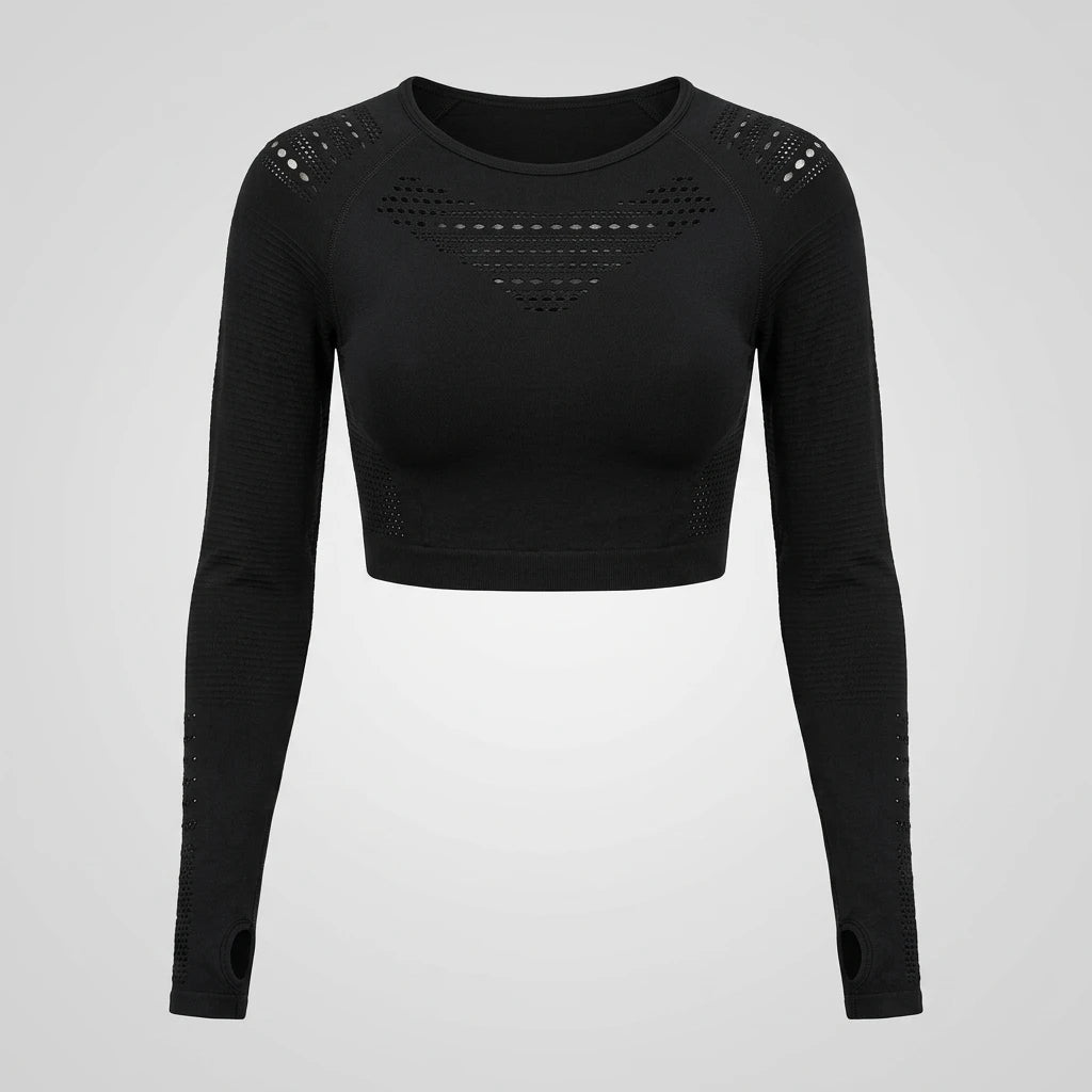 Svart mesh crop top framifrån med ventilerande hålmönster på bröstet mot ljusgrå bakgrund.