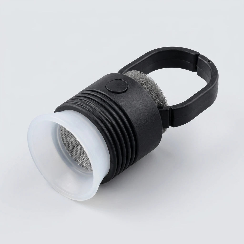 Isometrisk vy av Pigmentring 5-pack – svart ring, grå skumkudde och transparent kopp med metallnät.