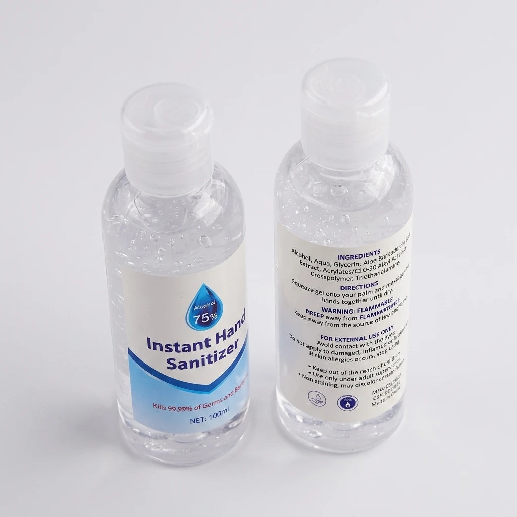 Två genomskinliga flaskor Handsprit Gel 100ml med vit kork, visade framifrån och bakifrån mot ljus bakgrund.