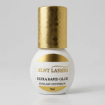 Vit rund flaska av Ultra Rapid Glue 5ml 0,5-1 Sek franslim med mönstrad guldkork mot en ljusgrå bakgrund.